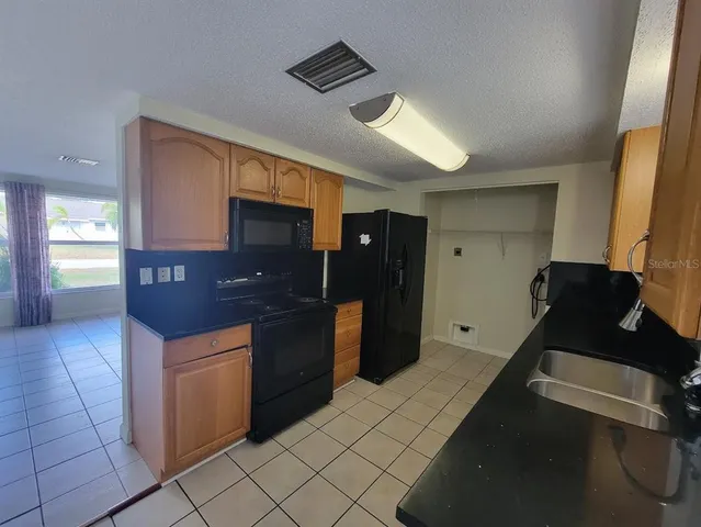 $1,695 | 22353 Buffalo Avenue, Port Charlotte, FL 33952