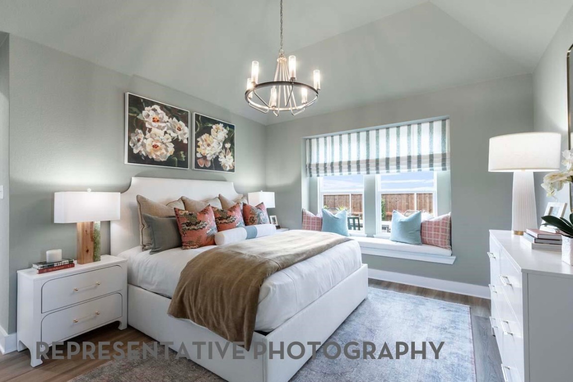 5331 Murillo Drive Manvel, TX 77578 - Photo 4 of 20 a spacious bedroom with a bed and a large window