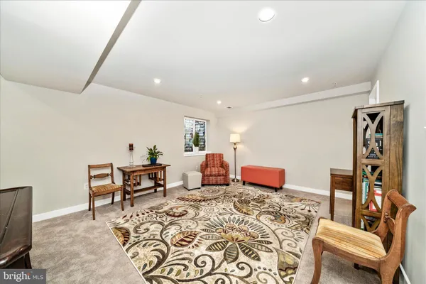 a living room with furniture and a table