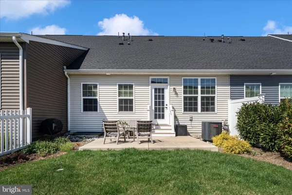 a view of a house with a big yard