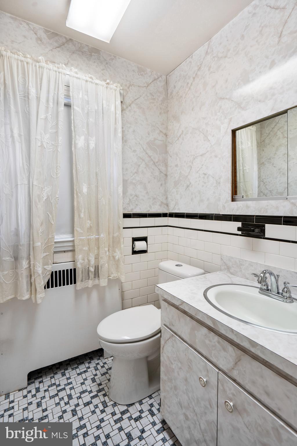 4826 Coleherne Road Baltimore, MD 21229 - Photo 22 of 44 Half Bath with Exquisite Features