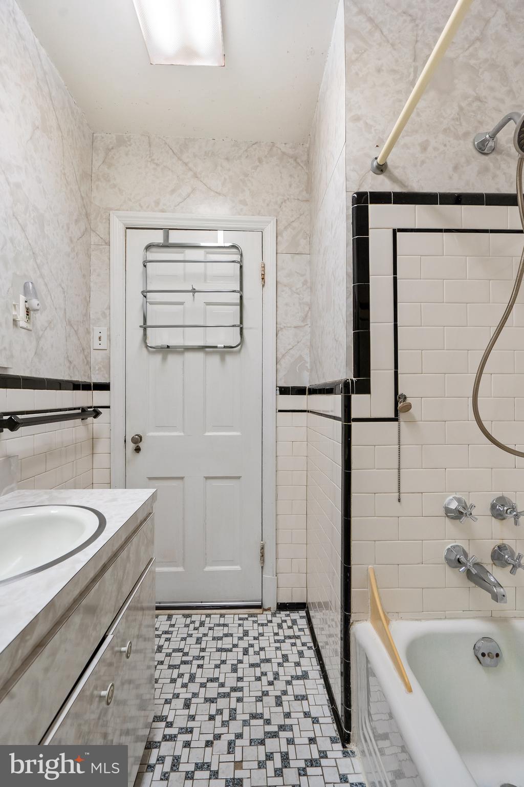 4826 Coleherne Road Baltimore, MD 21229 - Photo 27 of 44 Custom Tile And Sleek Finishes