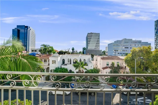 a view of a balcony with city view