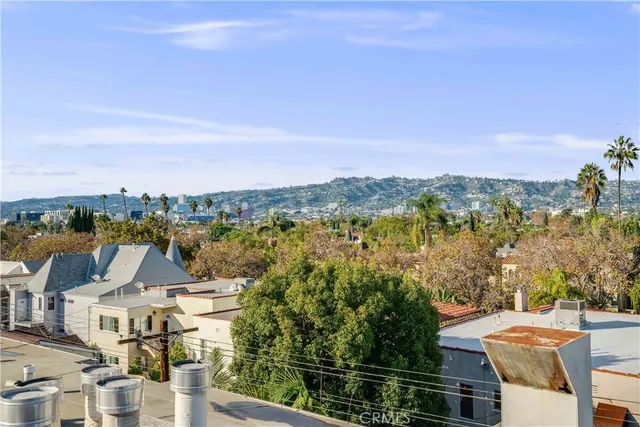 a view of city with tall buildings