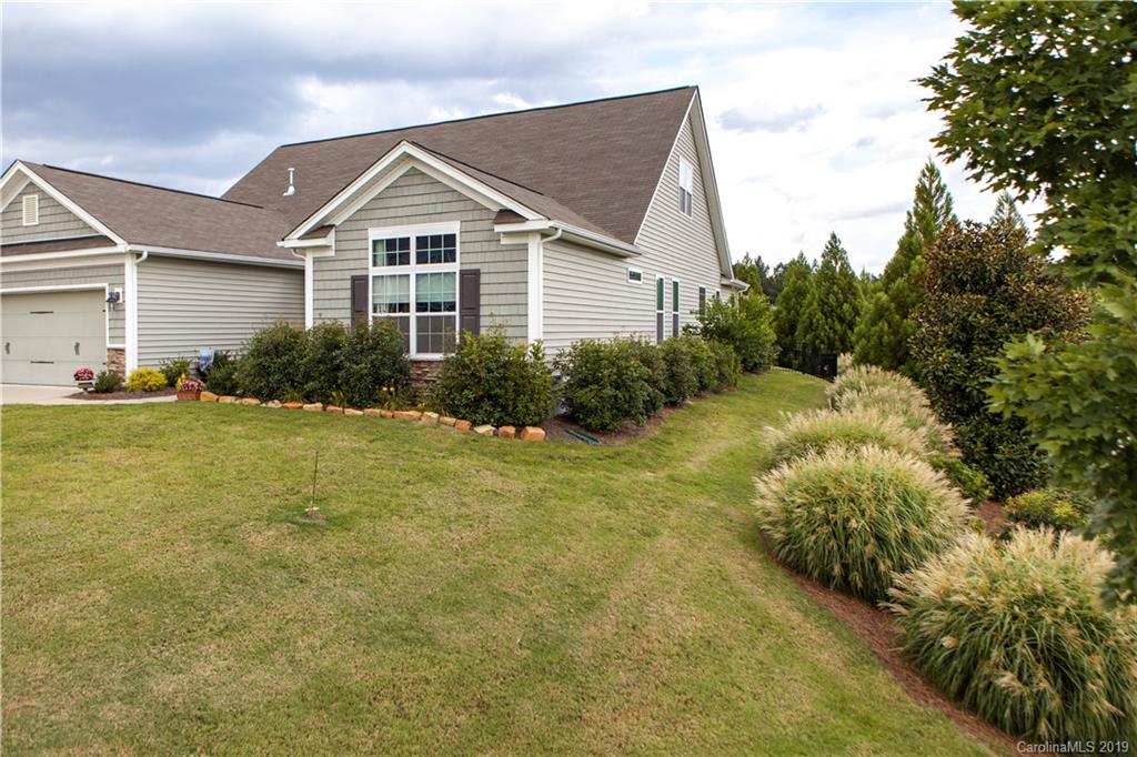 79026 Ridgehaven Road Lancaster, SC 29720 - Photo 2 of 30 a view of a big house with garden