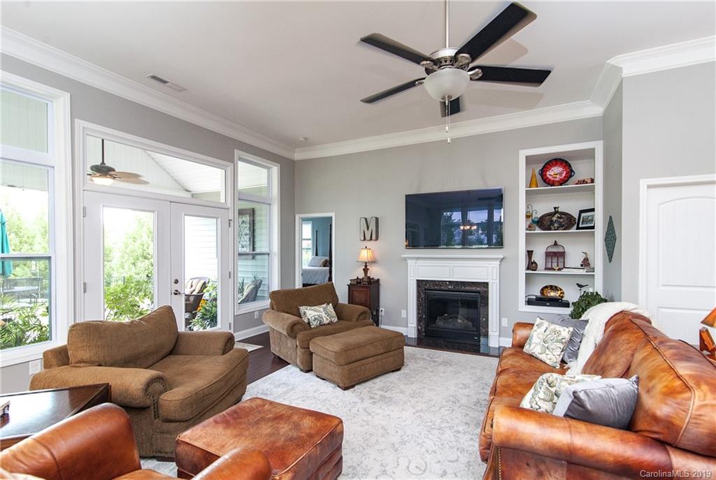 79026 Ridgehaven Road Lancaster, SC 29720 - Photo 11 of 30 a living room with furniture fireplace and window