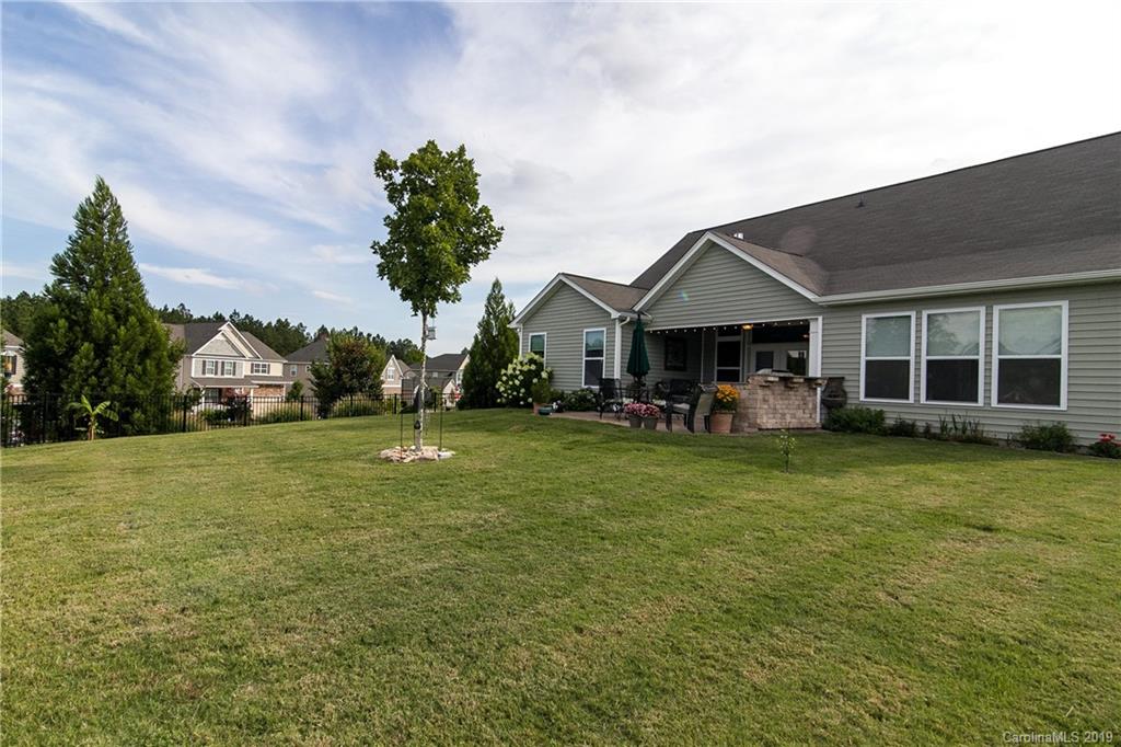 79026 Ridgehaven Road Lancaster, SC 29720 - Photo 28 of 30 a front view of a house with a garden and trees
