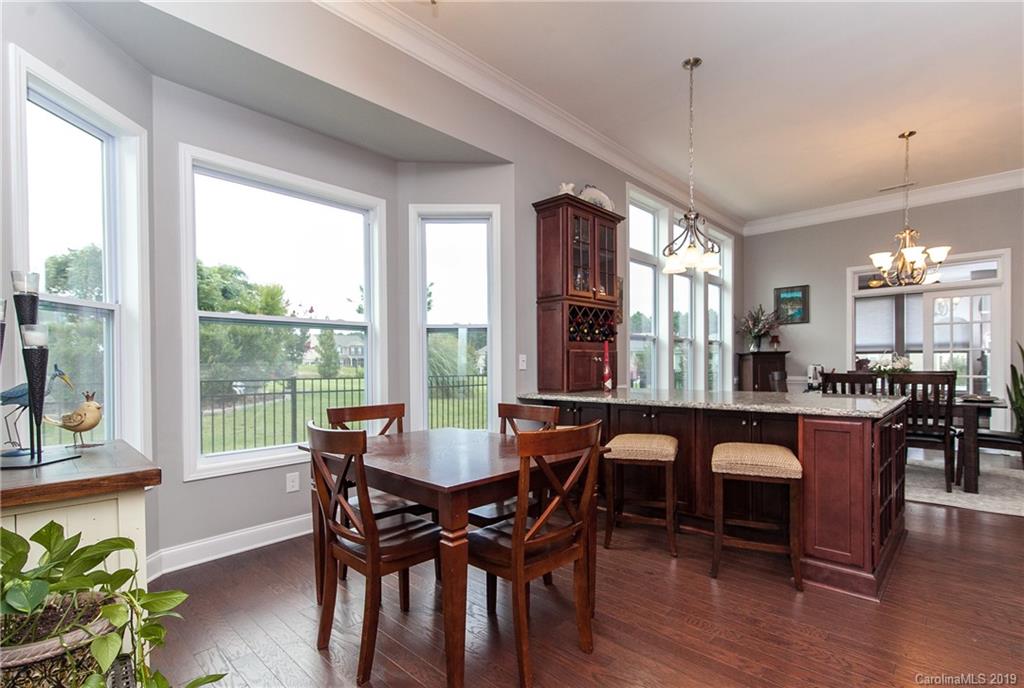 79026 Ridgehaven Road Lancaster, SC 29720 - Photo 7 of 30 a dining room with furniture window and wooden floor