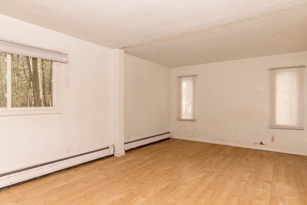 64 Hobbs Road Princeton, MA 01541 - Photo 10 of 22 an empty room with windows
