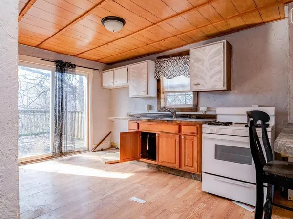 a view of a room that has a window in it