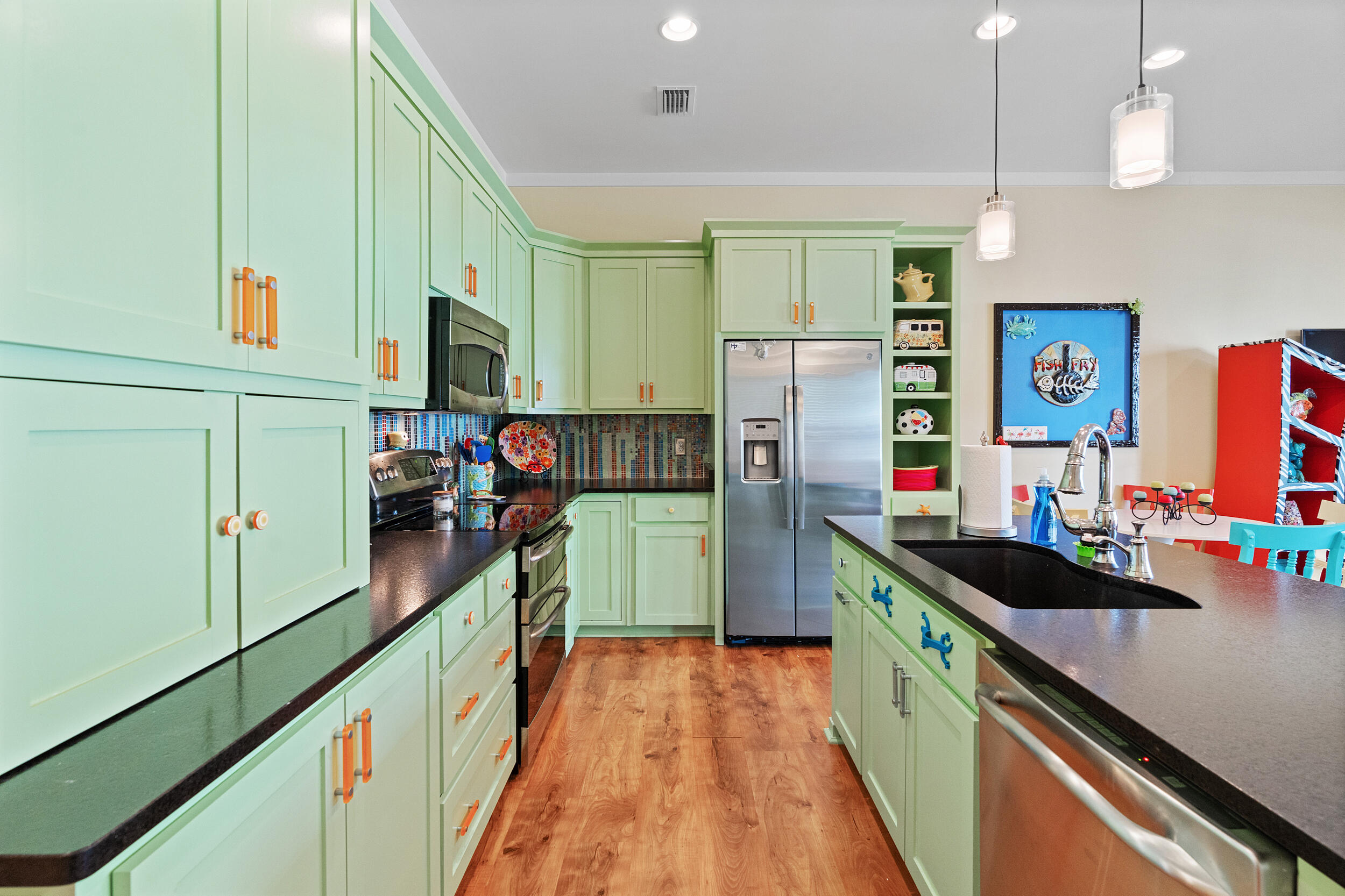 34 Blue Dolphin Loop Inlet Beach, FL 32461 - Photo 16 of 45 a kitchen with sink refrigerator and stove