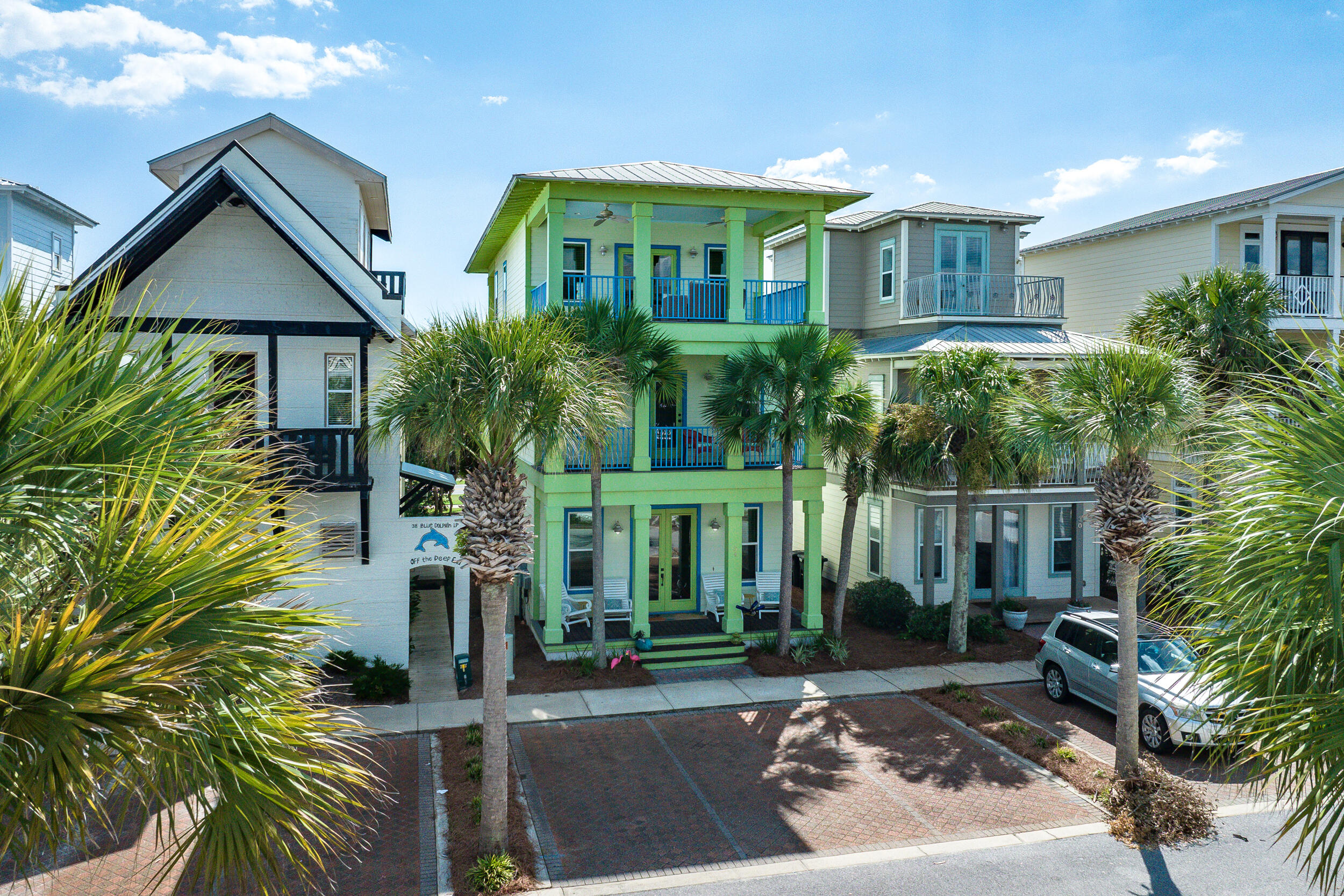 34 Blue Dolphin Loop Inlet Beach, FL 32461 - Photo 2 of 45 a front view of a house with garden