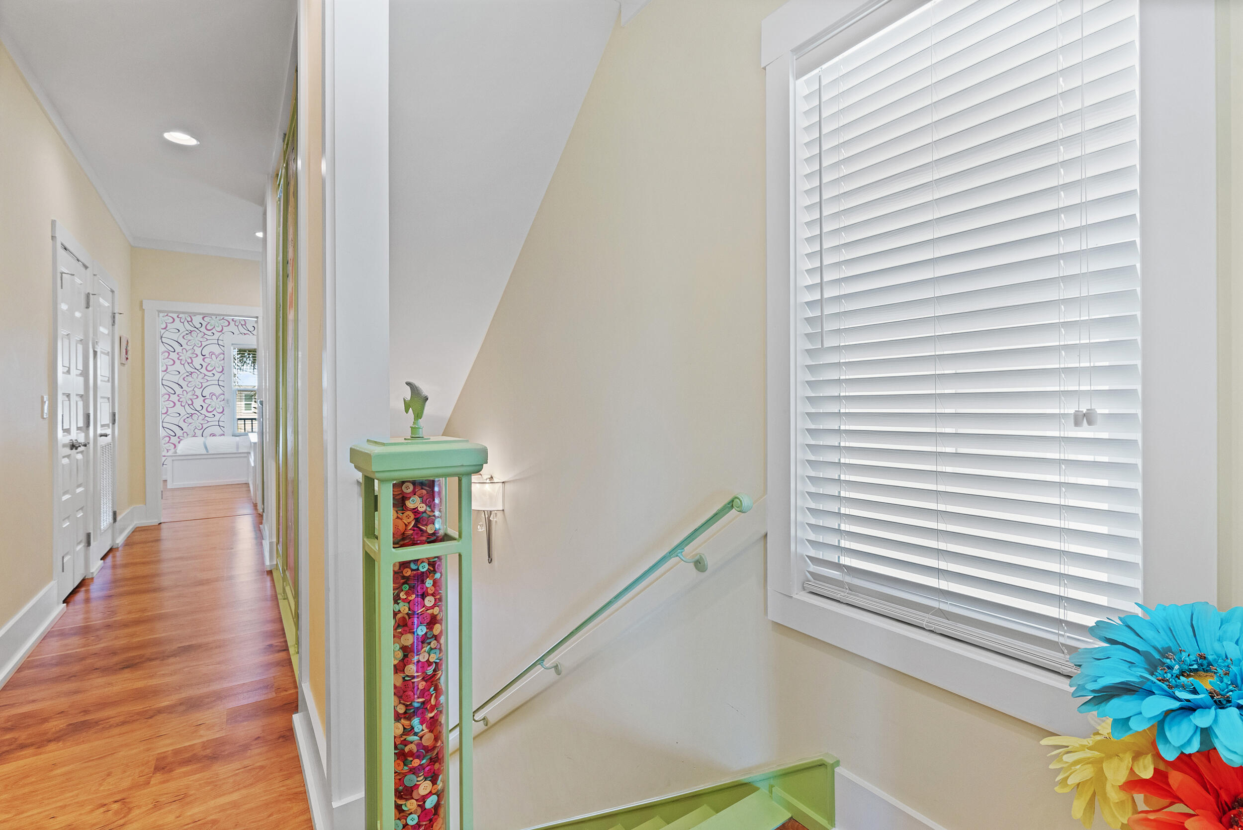 34 Blue Dolphin Loop Inlet Beach, FL 32461 - Photo 25 of 45 a view of a hallway with wooden floor and stairs