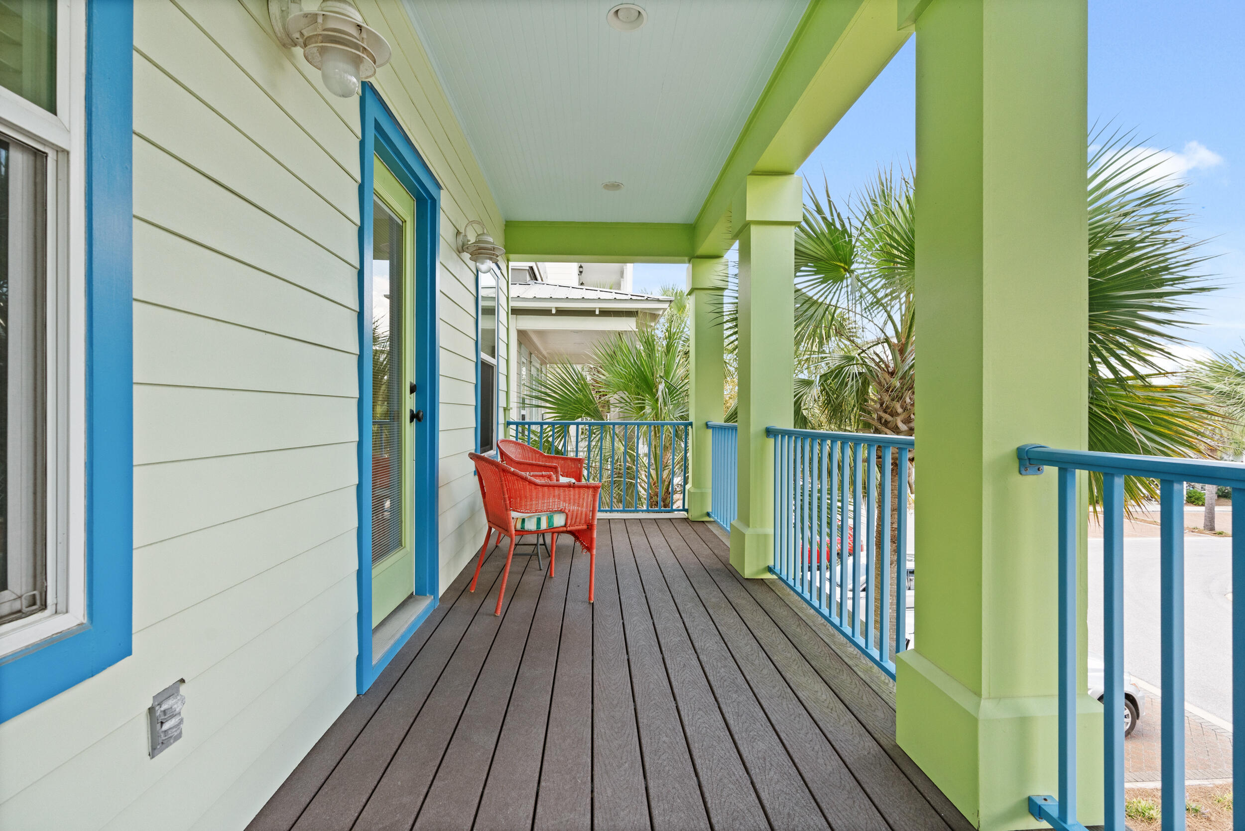34 Blue Dolphin Loop Inlet Beach, FL 32461 - Photo 33 of 45 a balcony with wooden floor table and chairs