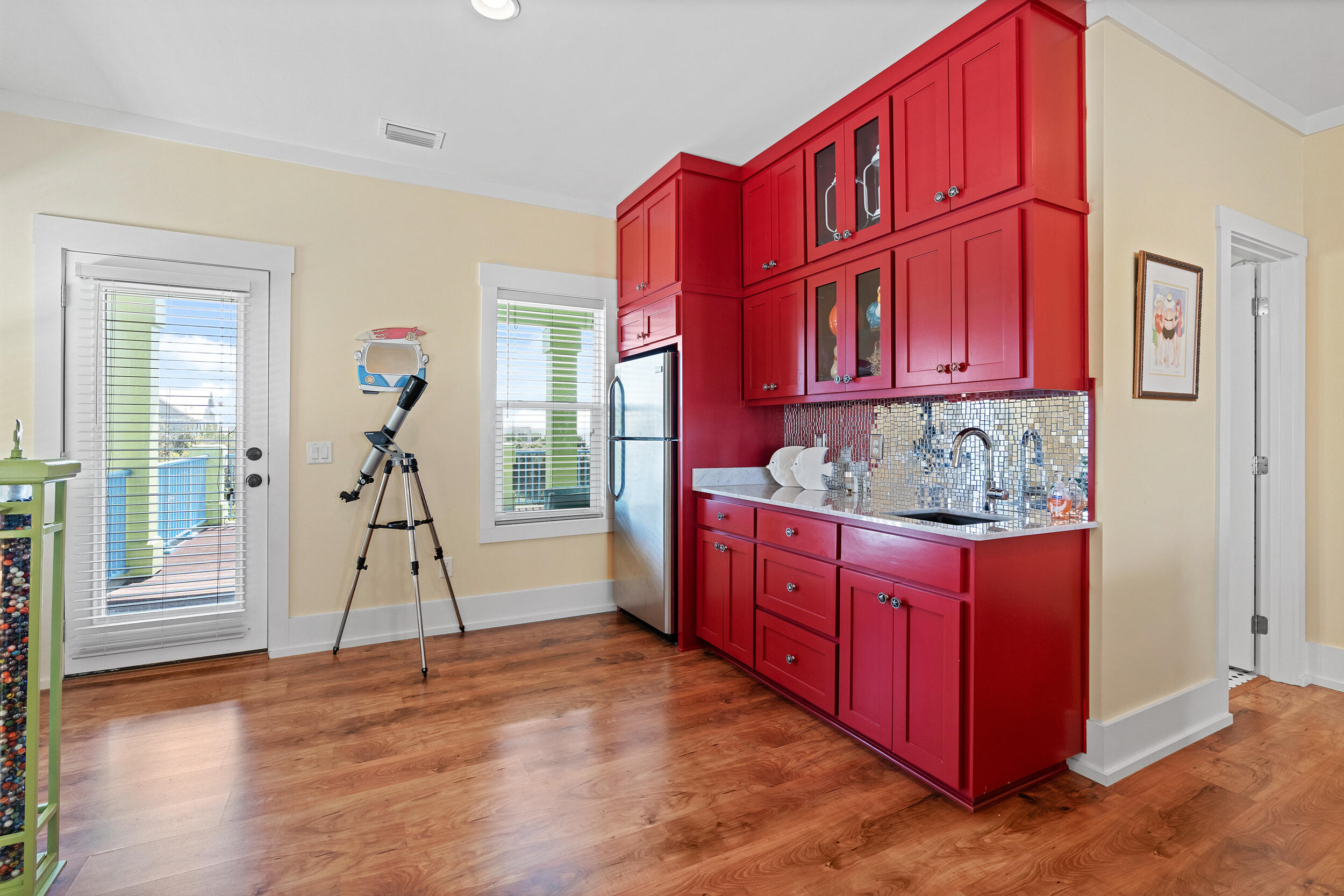 34 Blue Dolphin Loop Inlet Beach, FL 32461 - Photo 38 of 45 a view of an entryway with wooden floor and a livingroom