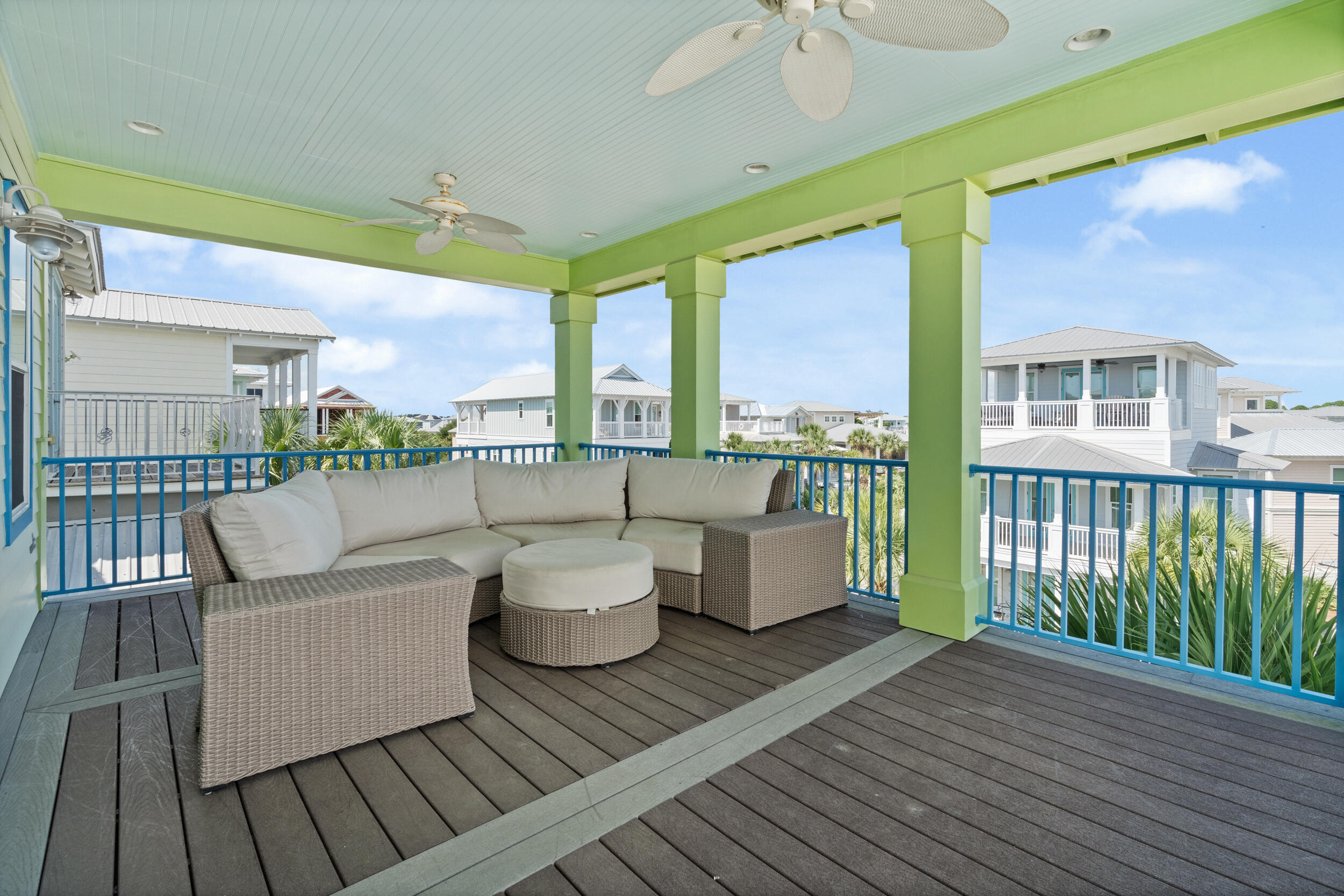 34 Blue Dolphin Loop Inlet Beach, FL 32461 - Photo 43 of 45 a view of a roof deck with couches and wooden floor