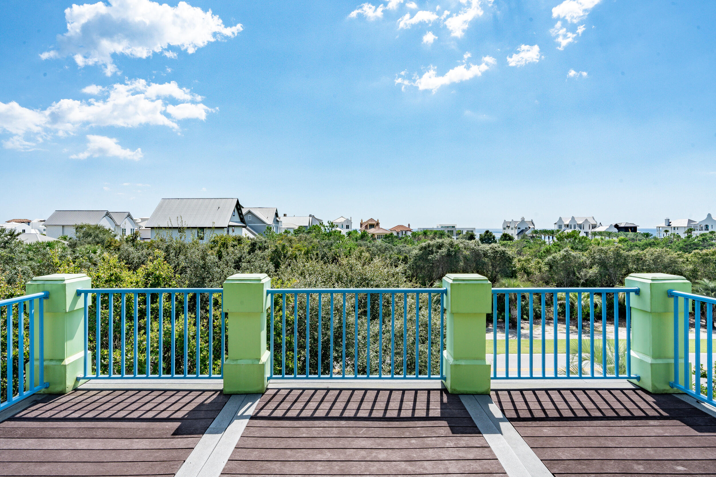 34 Blue Dolphin Loop Inlet Beach, FL 32461 - Photo 45 of 45 a balcony with wooden floor and fence