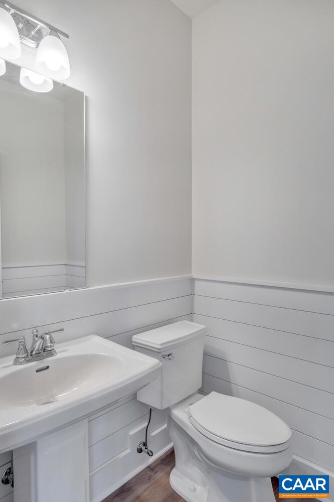 151 Agatha Ridge Lane Crozet, VA 22932 - Photo 23 of 52 a bathroom with a sink a toilet and a mirror