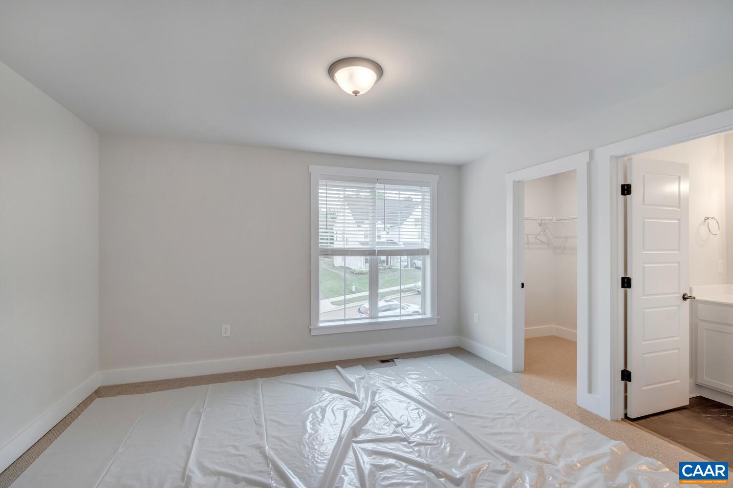 151 Agatha Ridge Lane Crozet, VA 22932 - Photo 36 of 52 a view of an empty room with a window
