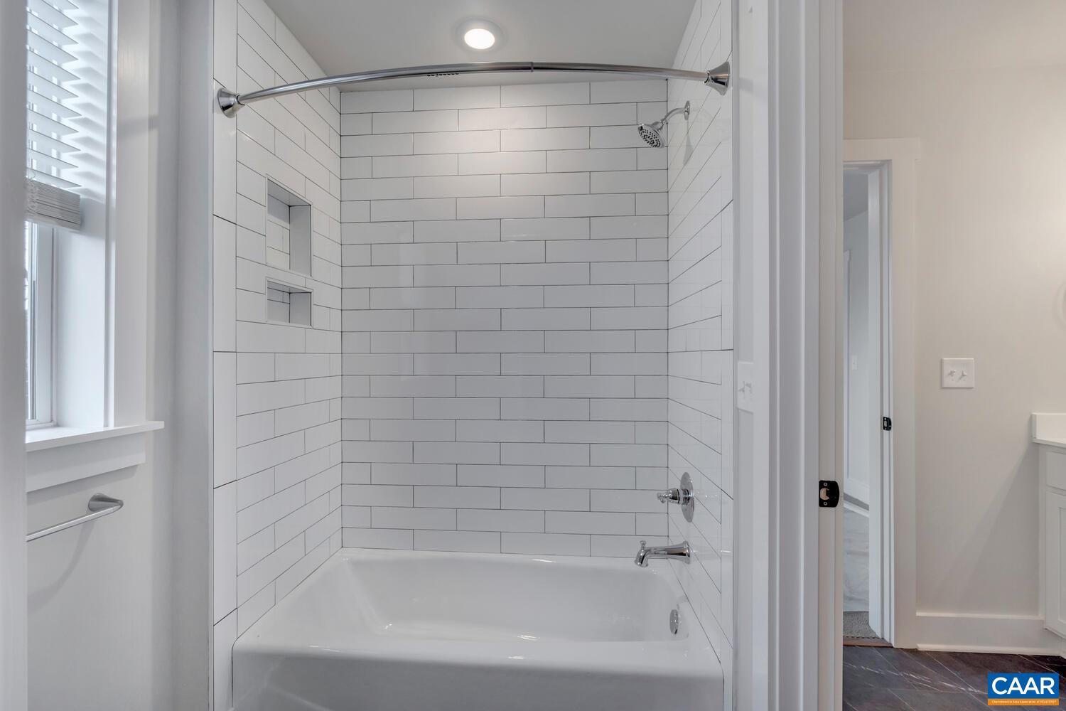 151 Agatha Ridge Lane Crozet, VA 22932 - Photo 38 of 52 a bathroom with a shower and a bath tub