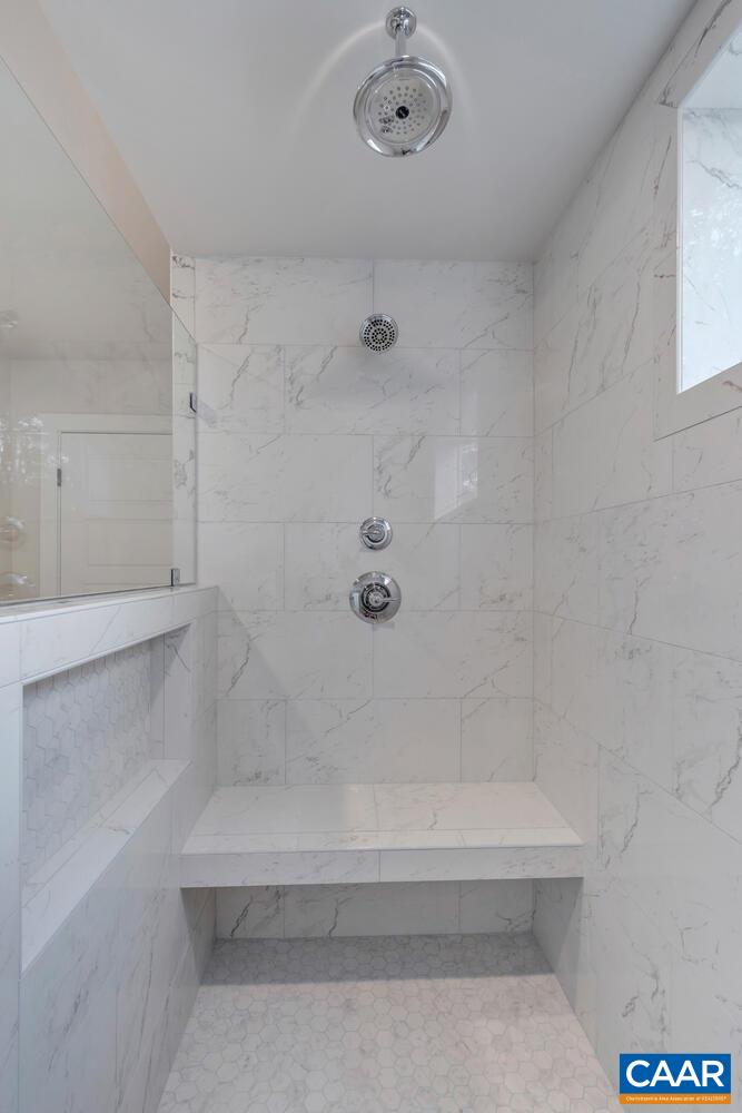 151 Agatha Ridge Lane Crozet, VA 22932 - Photo 47 of 52 a bathroom with a bathtub