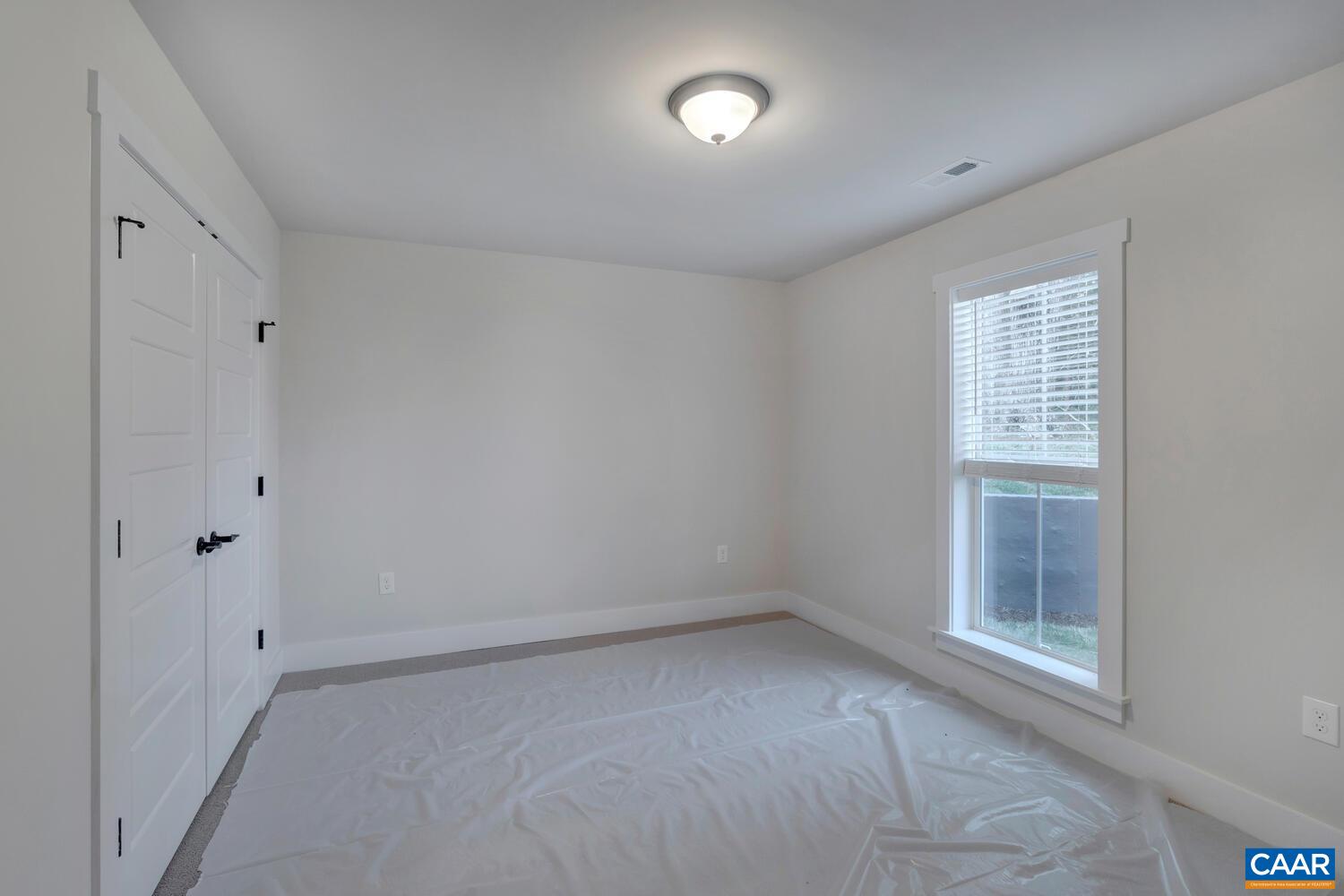 151 Agatha Ridge Lane Crozet, VA 22932 - Photo 51 of 52 a view of an empty room with a window