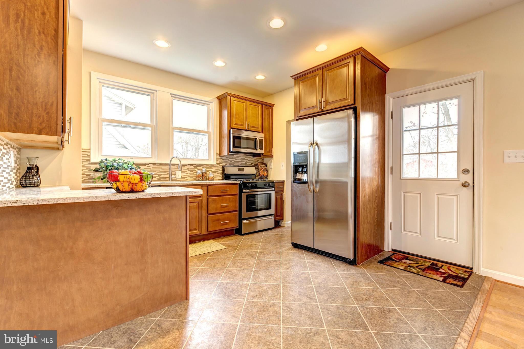 4501 Raspe Avenue Baltimore, MD 21206 - Photo 11 of 30 Deluxe Kitchen With Stainless Steel Appliances