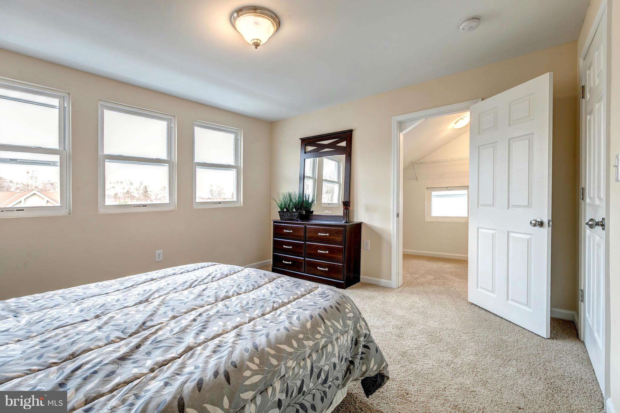 4501 Raspe Avenue Baltimore, MD 21206 - Photo 16 of 30 Master Bedroom With Plush Carpet