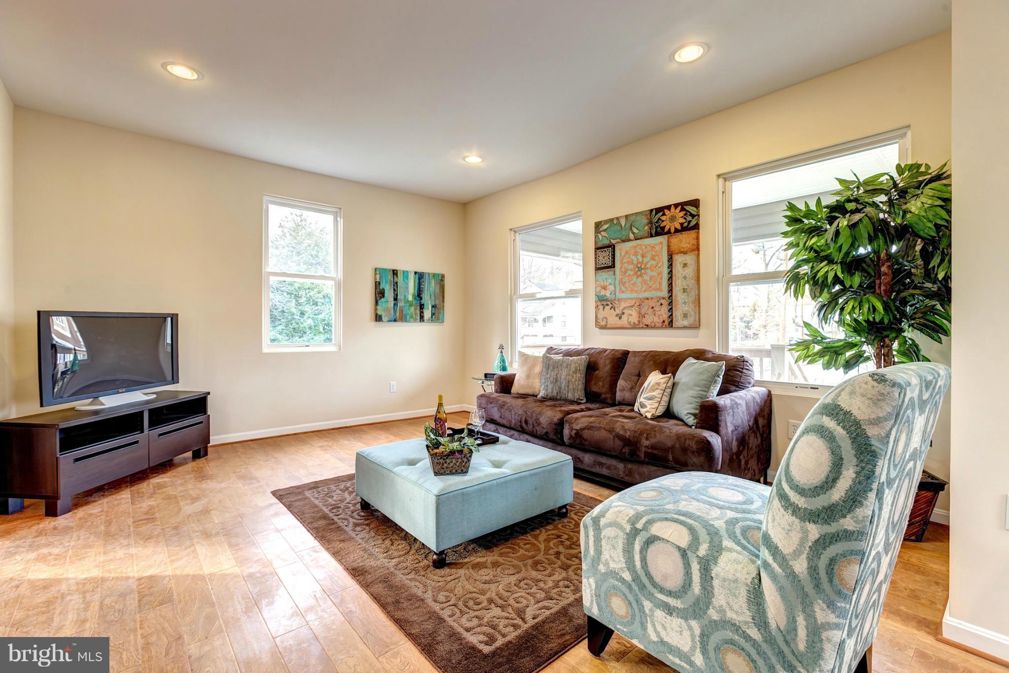 4501 Raspe Avenue Baltimore, MD 21206 - Photo 3 of 30 Living Room With Hardwood Floors