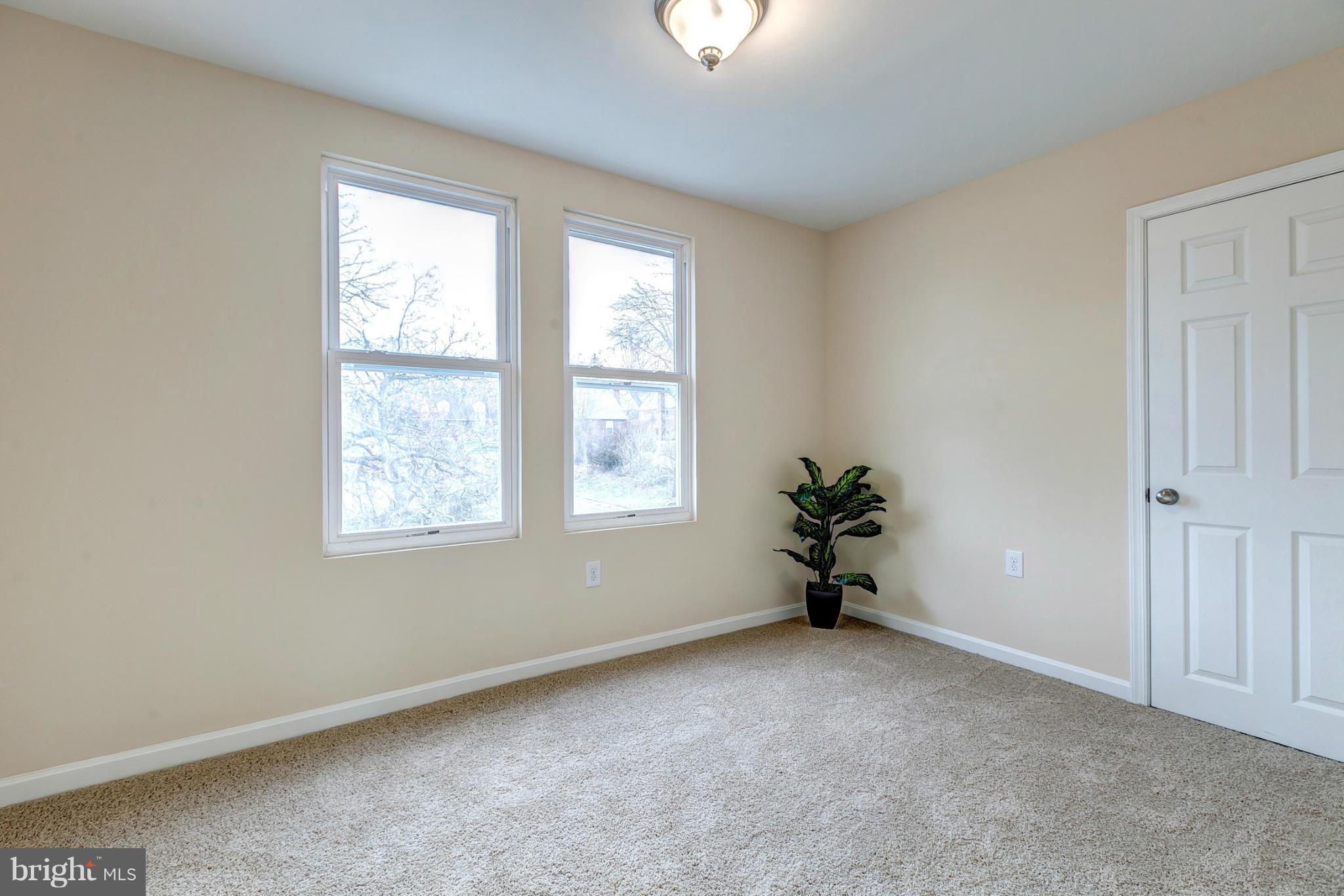 4501 Raspe Avenue Baltimore, MD 21206 - Photo 21 of 30 Bedroom With Plush Carpet