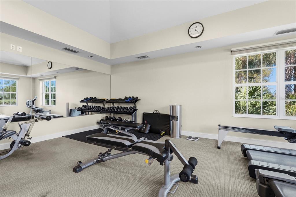 357 Marsh Creek Road Venice, FL 34292 - Photo 66 of 70 a view of a workspace with gym cycle and a window