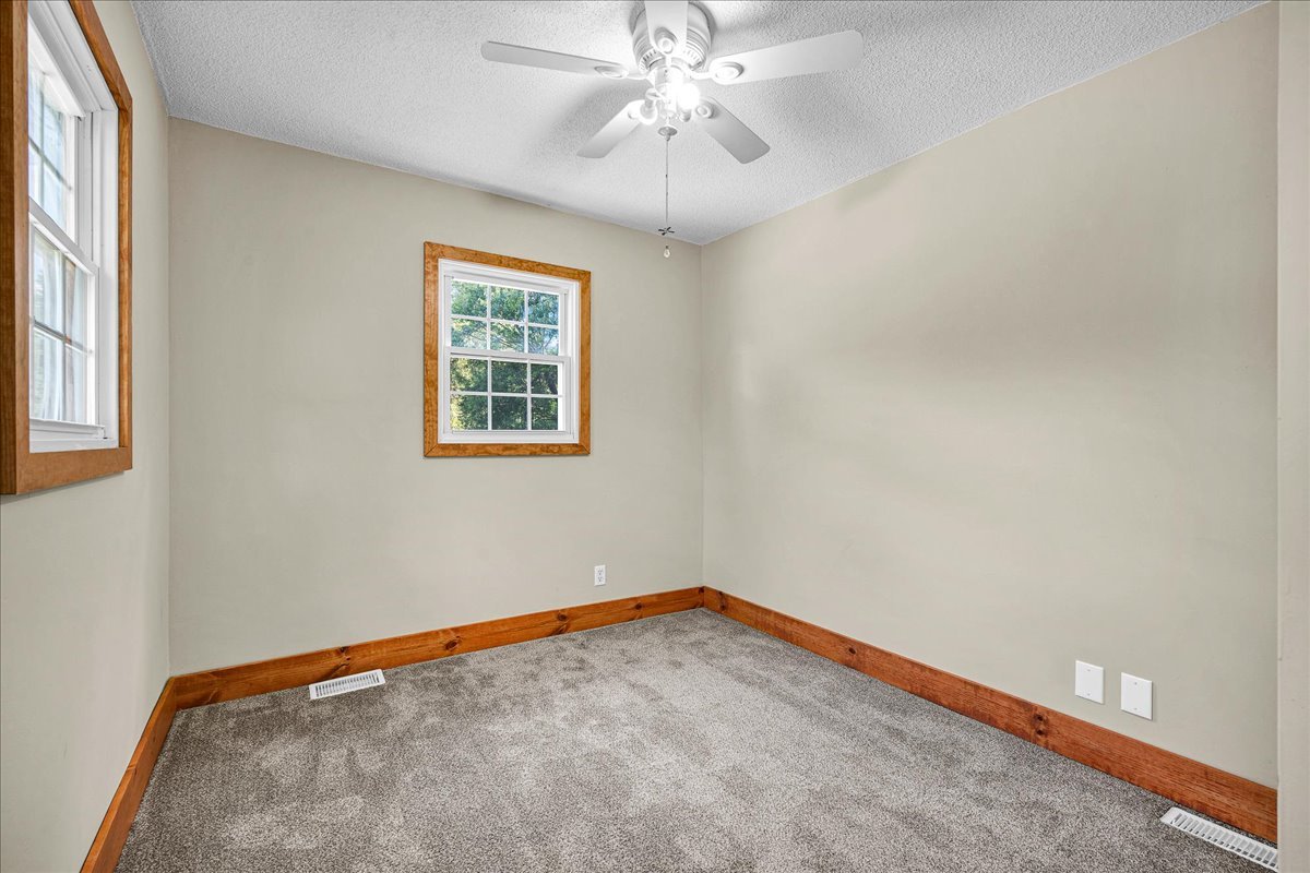 116 Lakeview Road East Galesburg, IL 61430 - Photo 24 of 36 a view of an empty room with a window
