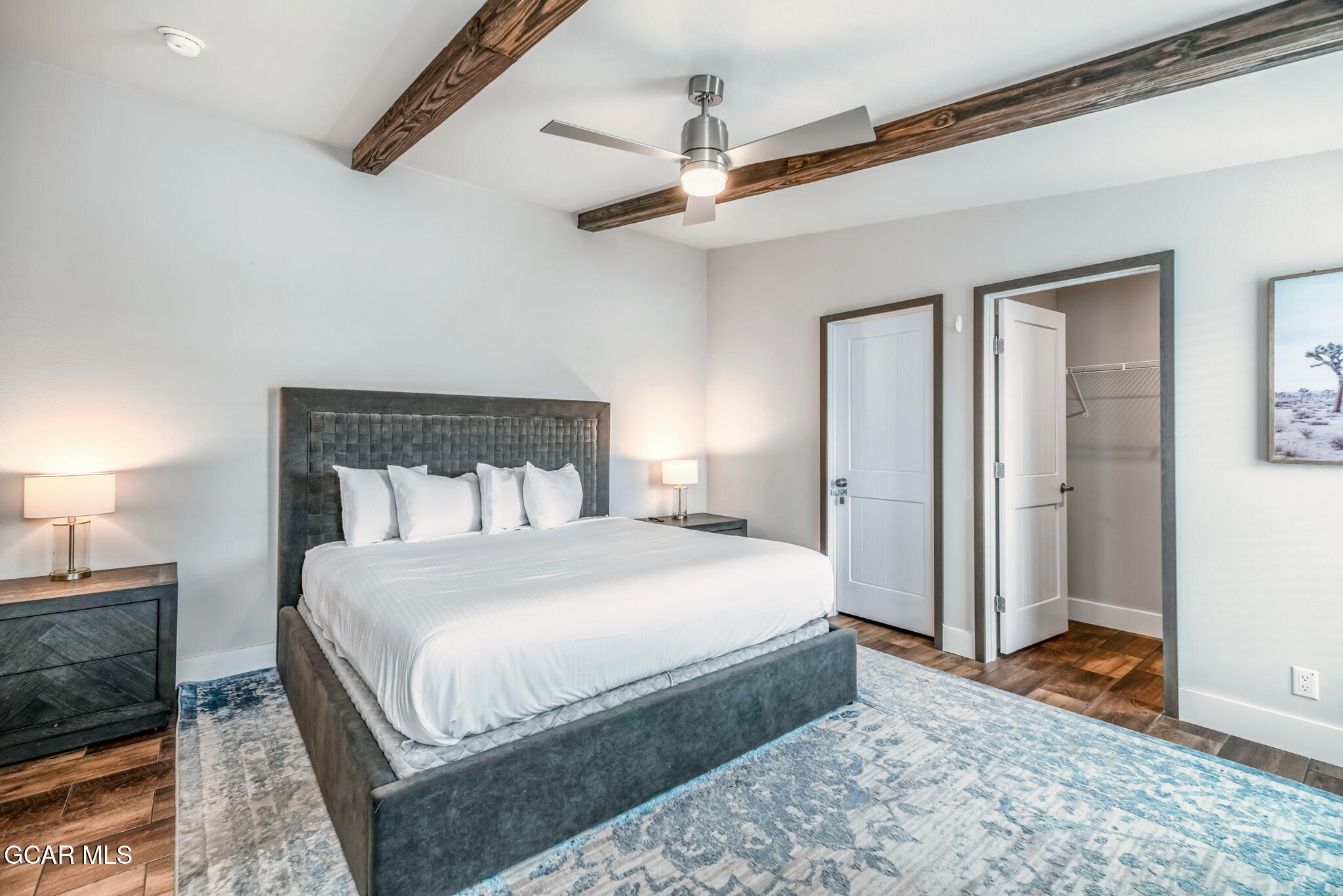 1051 Summit Trail Granby, CO 80446 - Photo 11 of 66 a bedroom with a bed and a dresser