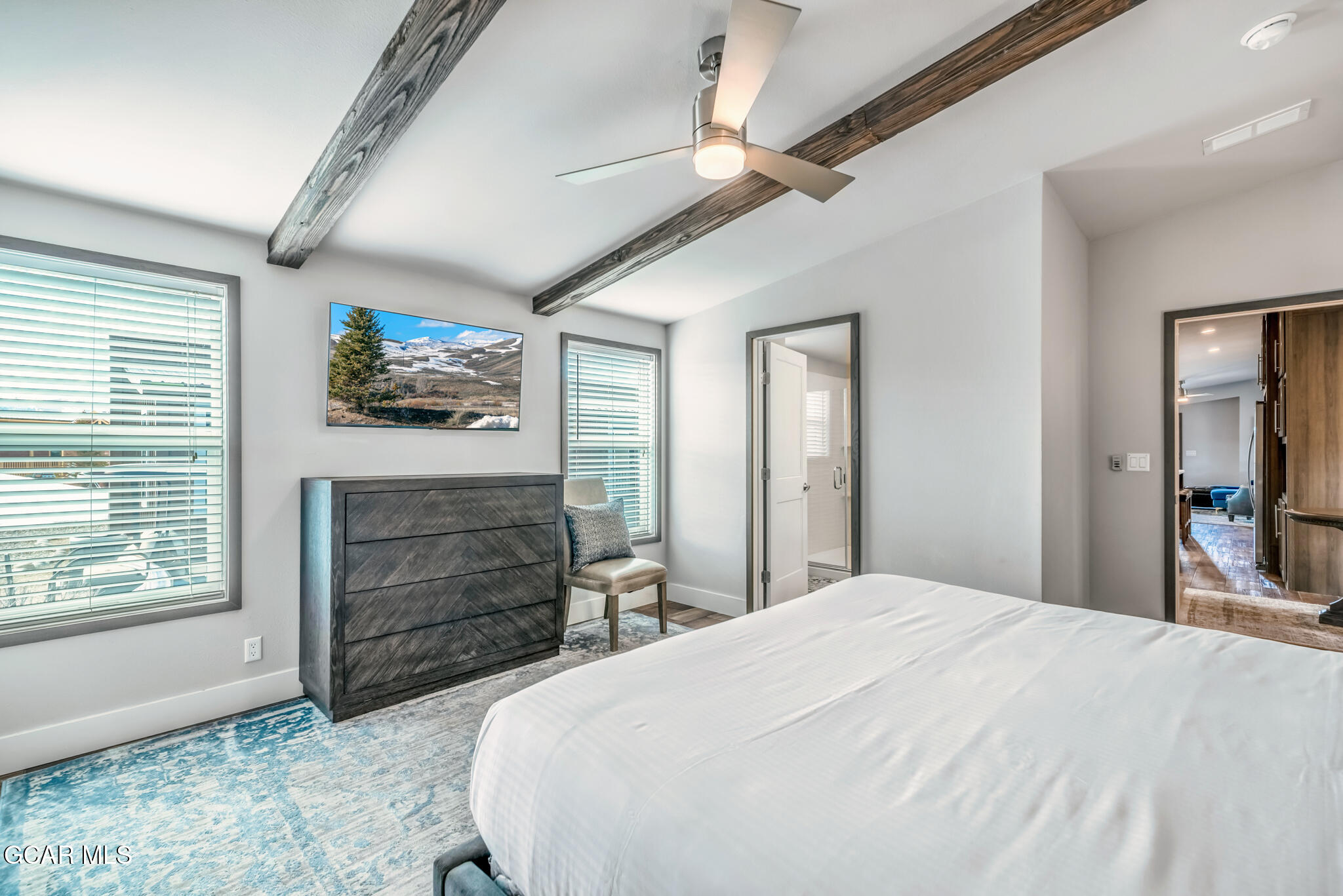 1051 Summit Trail Granby, CO 80446 - Photo 16 of 66 a bed room with a bed and a television