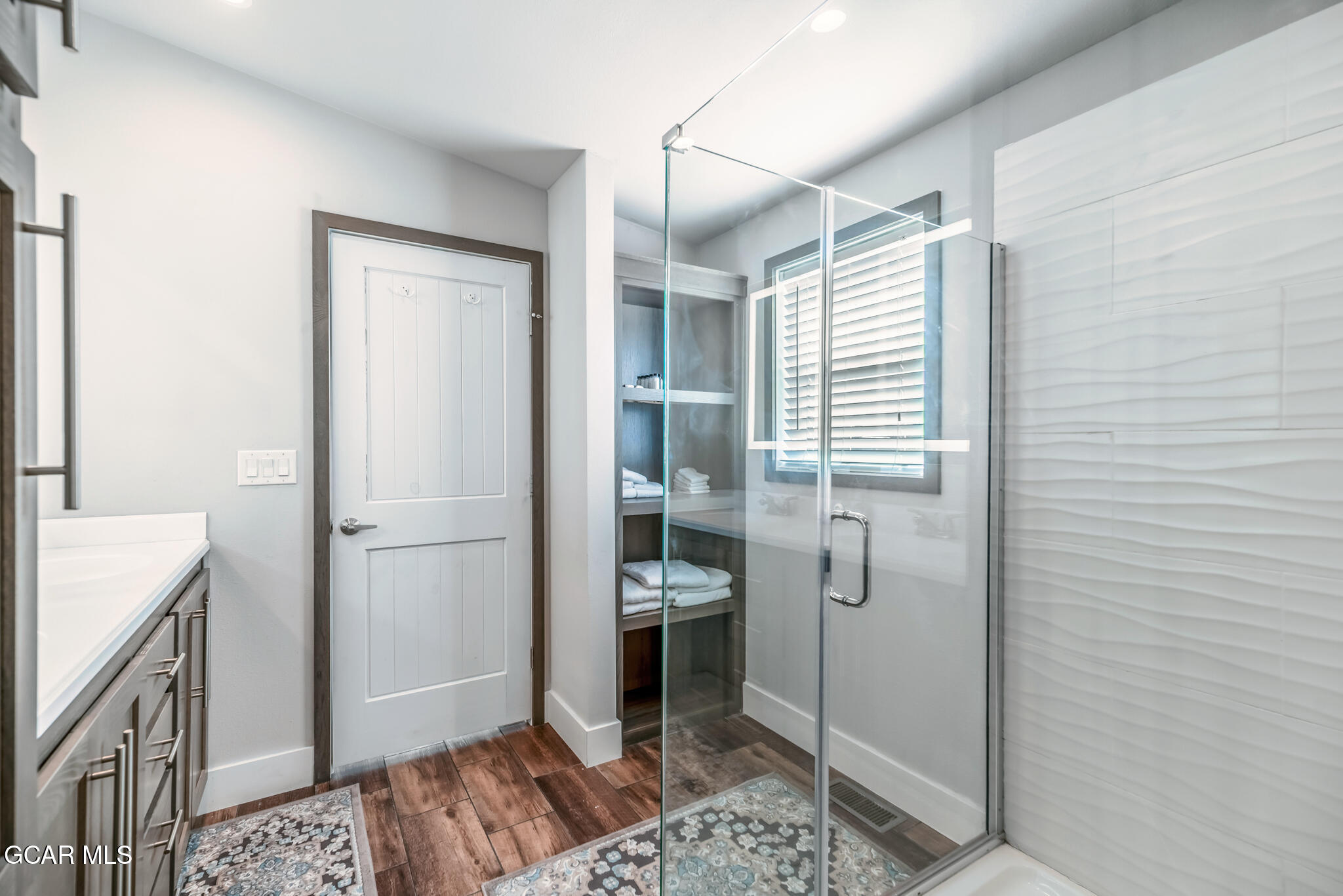 1051 Summit Trail Granby, CO 80446 - Photo 18 of 66 a bathroom with a tub shower and toilet