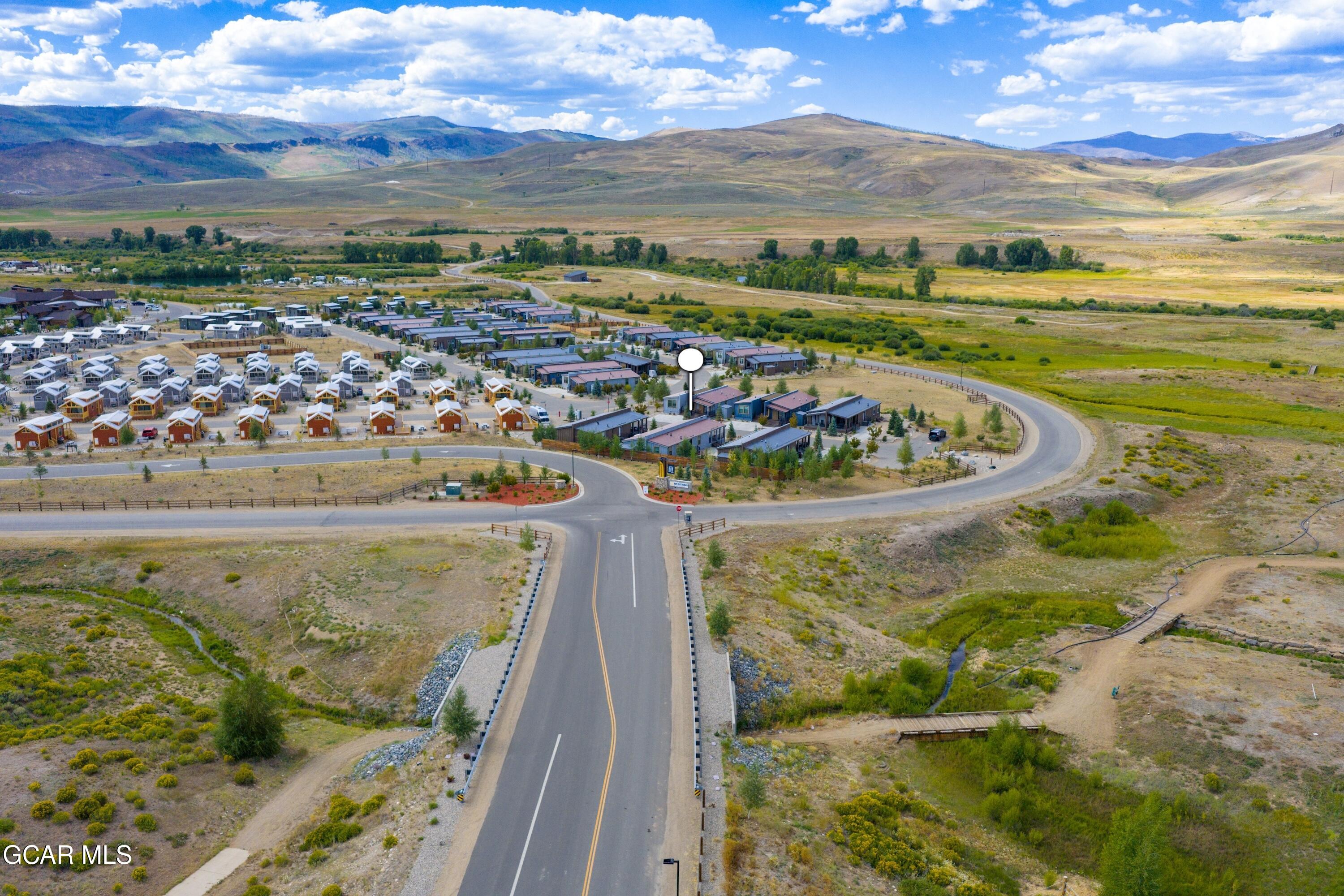 1051 Summit Trail Granby, CO 80446 - Photo 3 of 66 a view of a swimming pool with a lake view