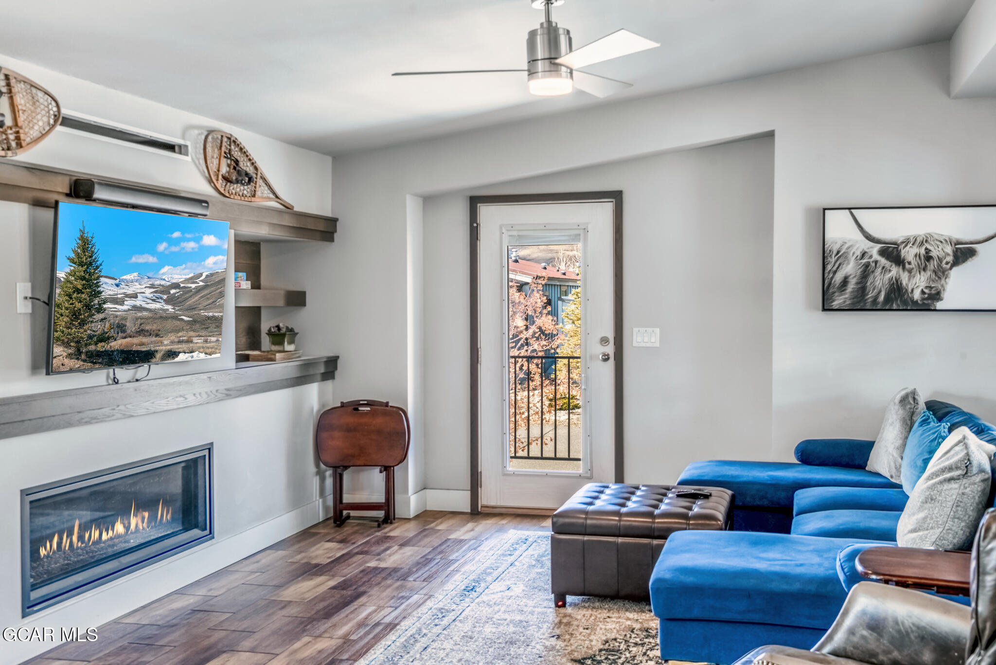 1051 Summit Trail Granby, CO 80446 - Photo 38 of 66 a living room with furniture and a fireplace