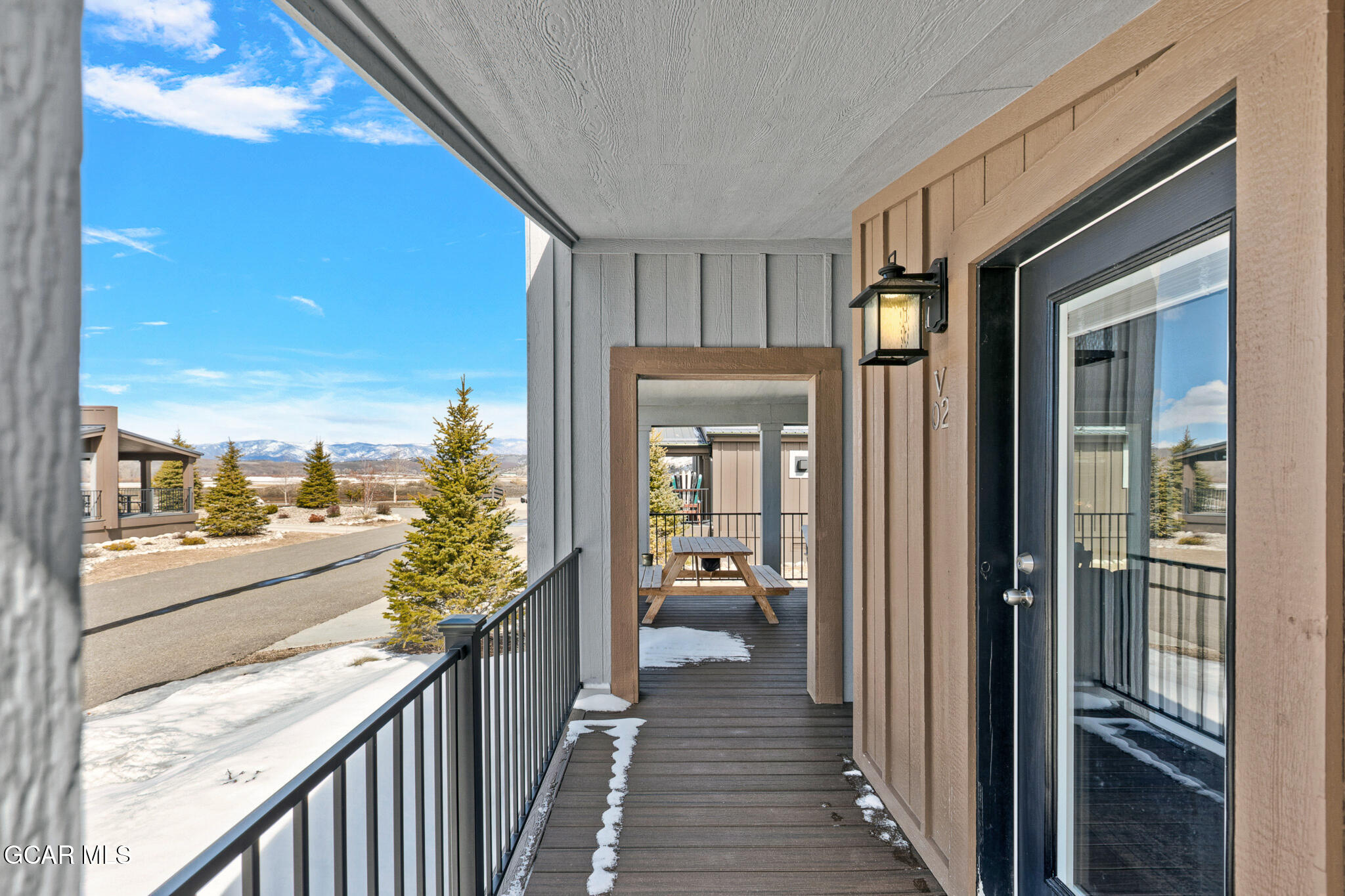 1051 Summit Trail Granby, CO 80446 - Photo 45 of 66 a view of a balcony with wooden floor
