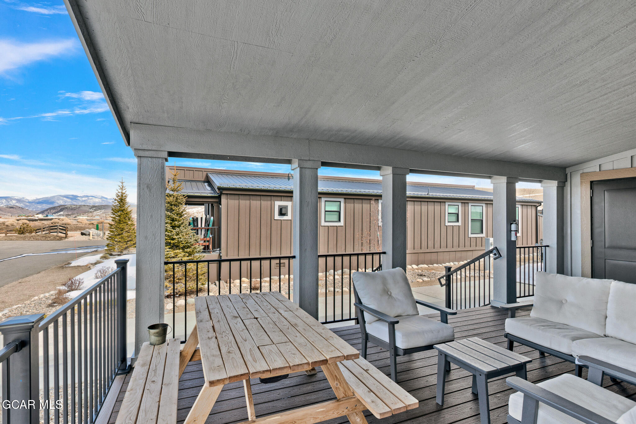 1051 Summit Trail Granby, CO 80446 - Photo 51 of 66 a view of a balcony with wooden floor