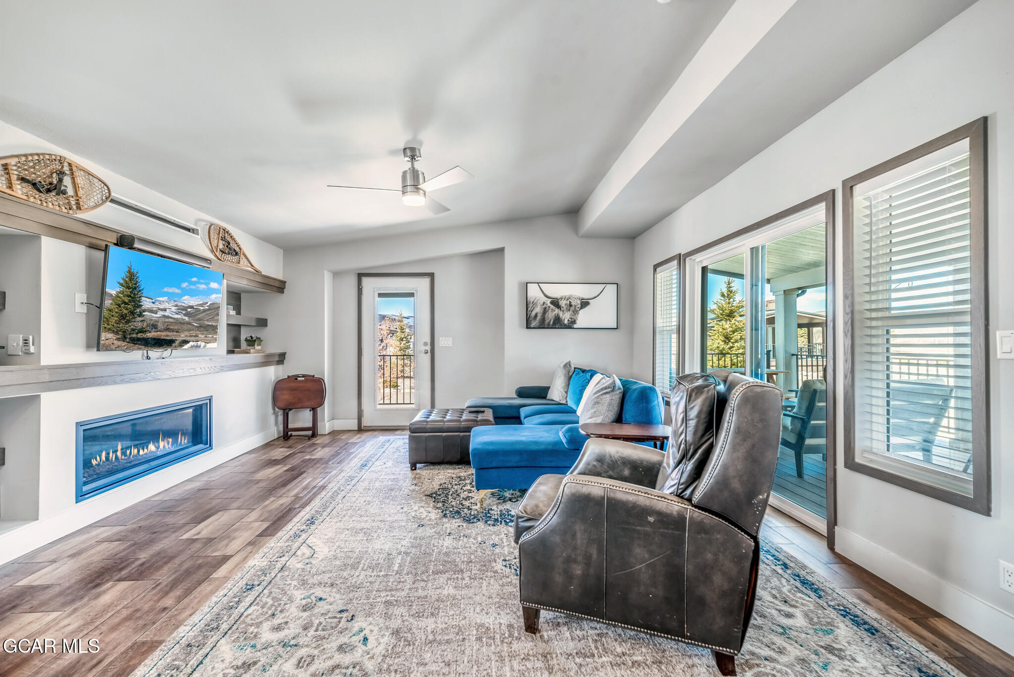 1051 Summit Trail Granby, CO 80446 - Photo 55 of 66 a living room with furniture and a fireplace