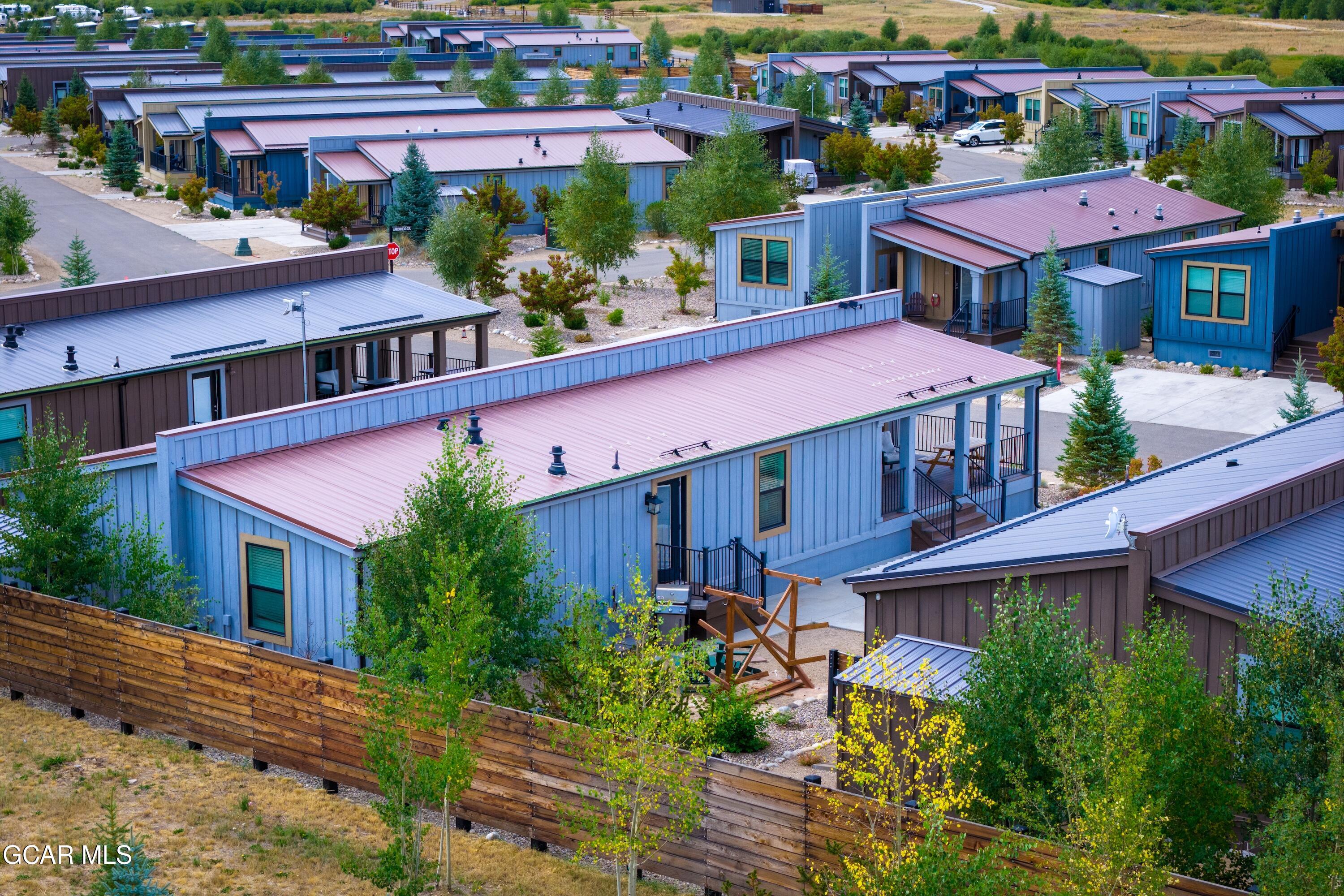 1051 Summit Trail Granby, CO 80446 - Photo 61 of 66 an aerial view of a house with yard