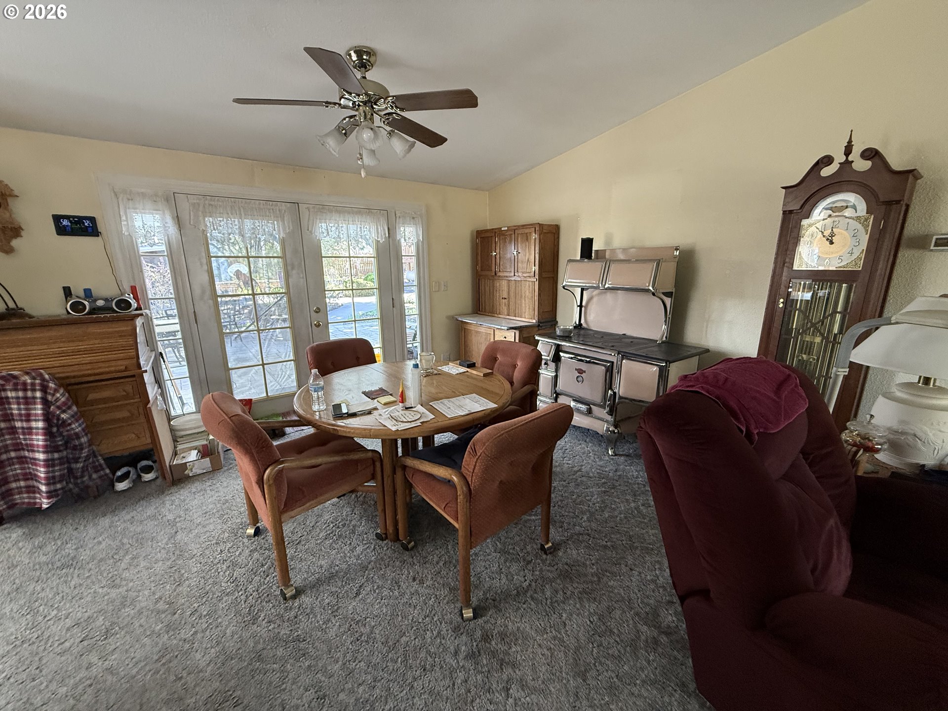 110 South Mike Road Tygh Valley, OR 97063 - Photo 26 of 42 a living room with furniture and a clock