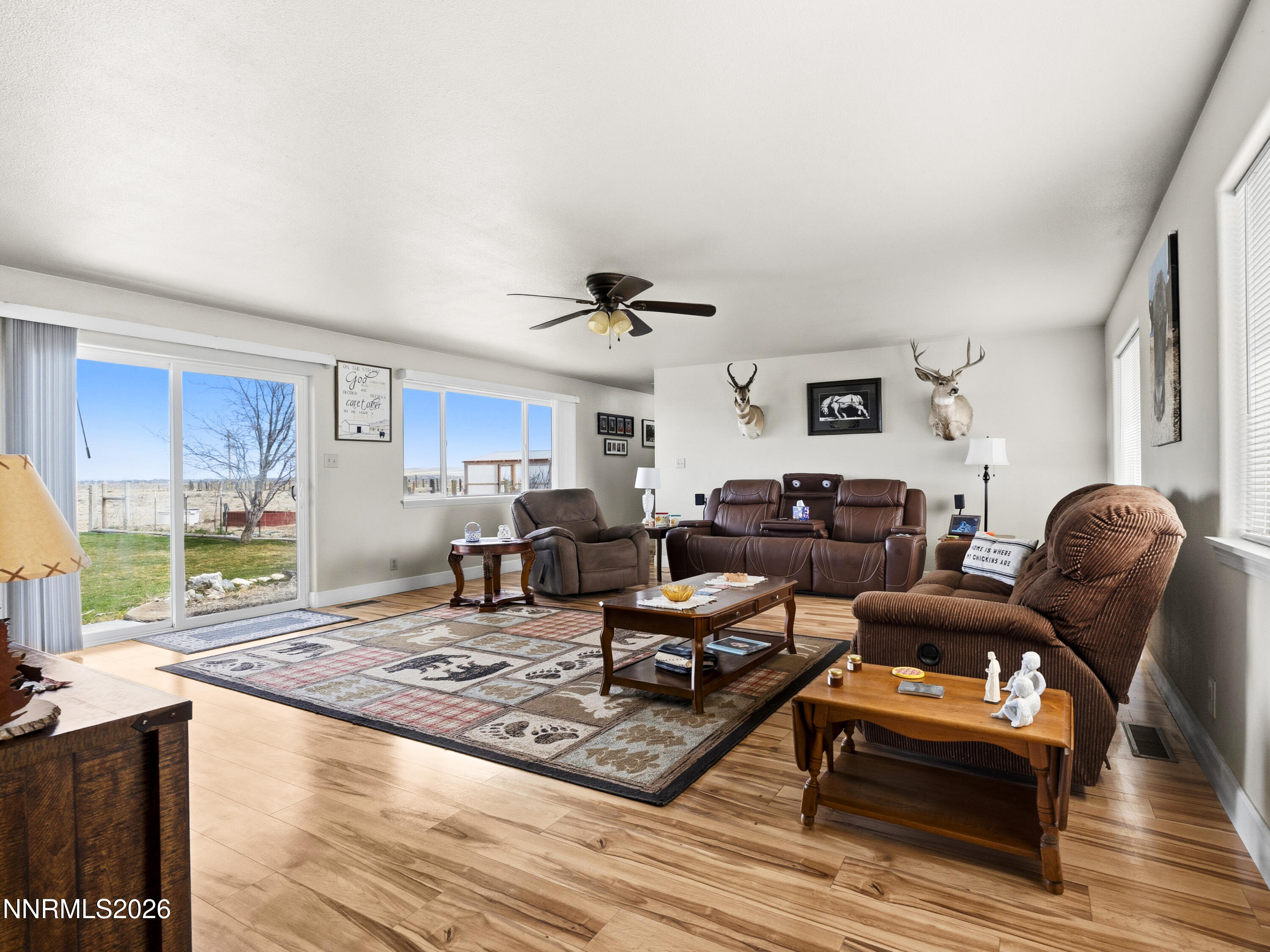2625 Muddy Road Winnemucca, NV 89445 - Photo 34 of 49 a living room with furniture rug and wooden floor