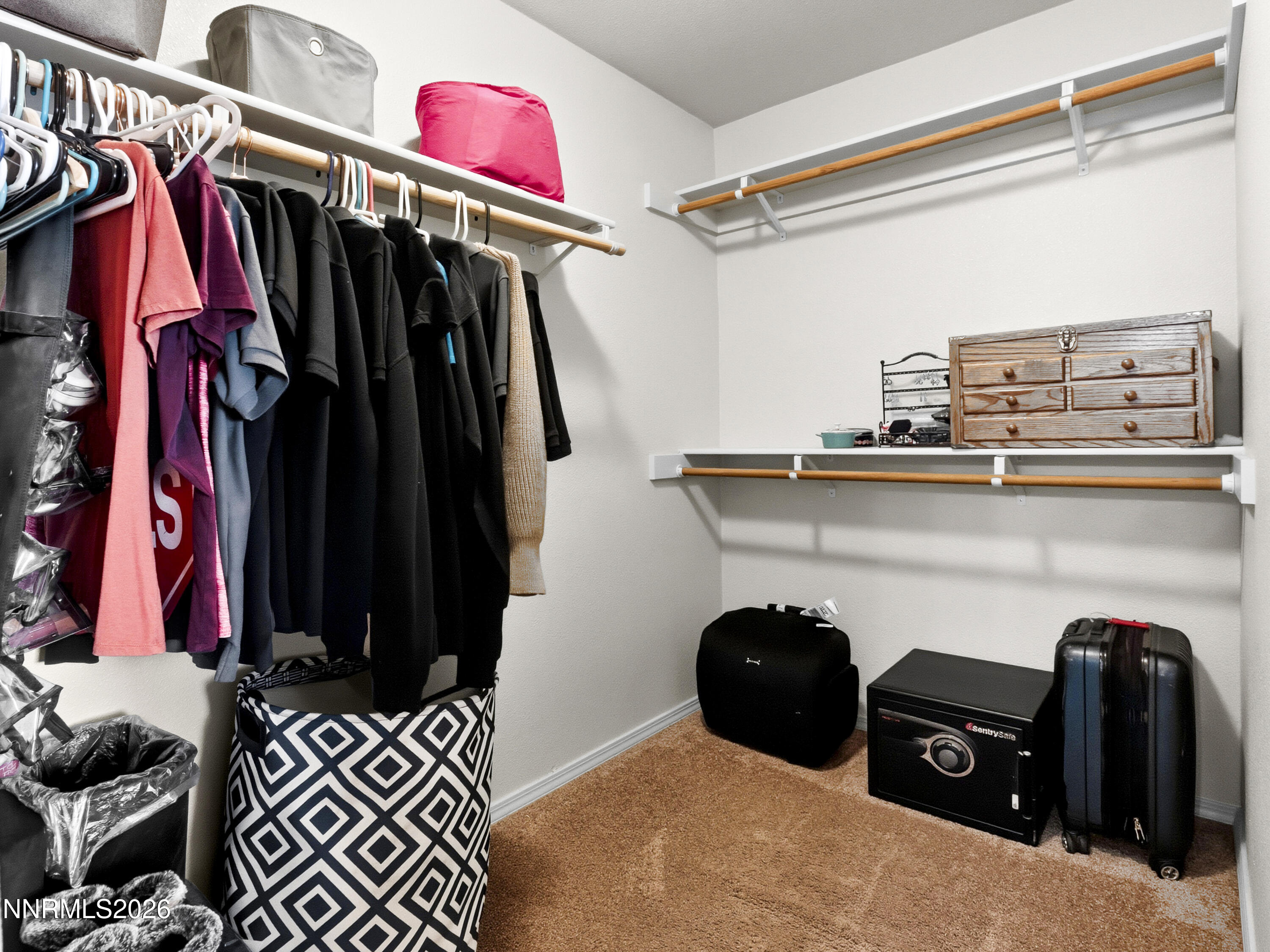 2625 Muddy Road Winnemucca, NV 89445 - Photo 46 of 49 a view of walk in closet with clothes and shoes