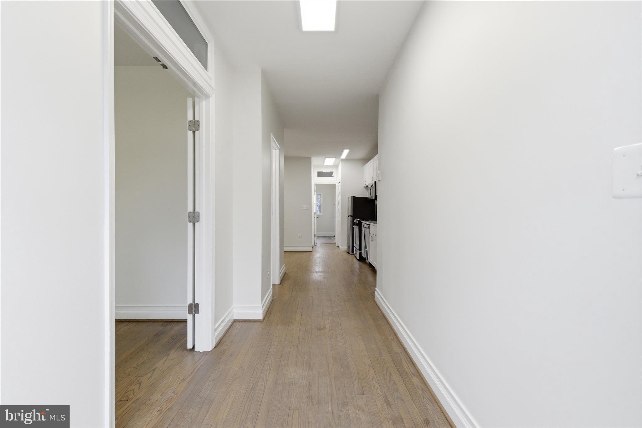 221 20th Street Northeast, Unit 3 Washington, DC 20002 - Photo 2 of 30 a view of a hallway with wooden floor