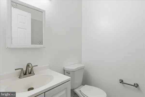 a bathroom with a sink and a toilet