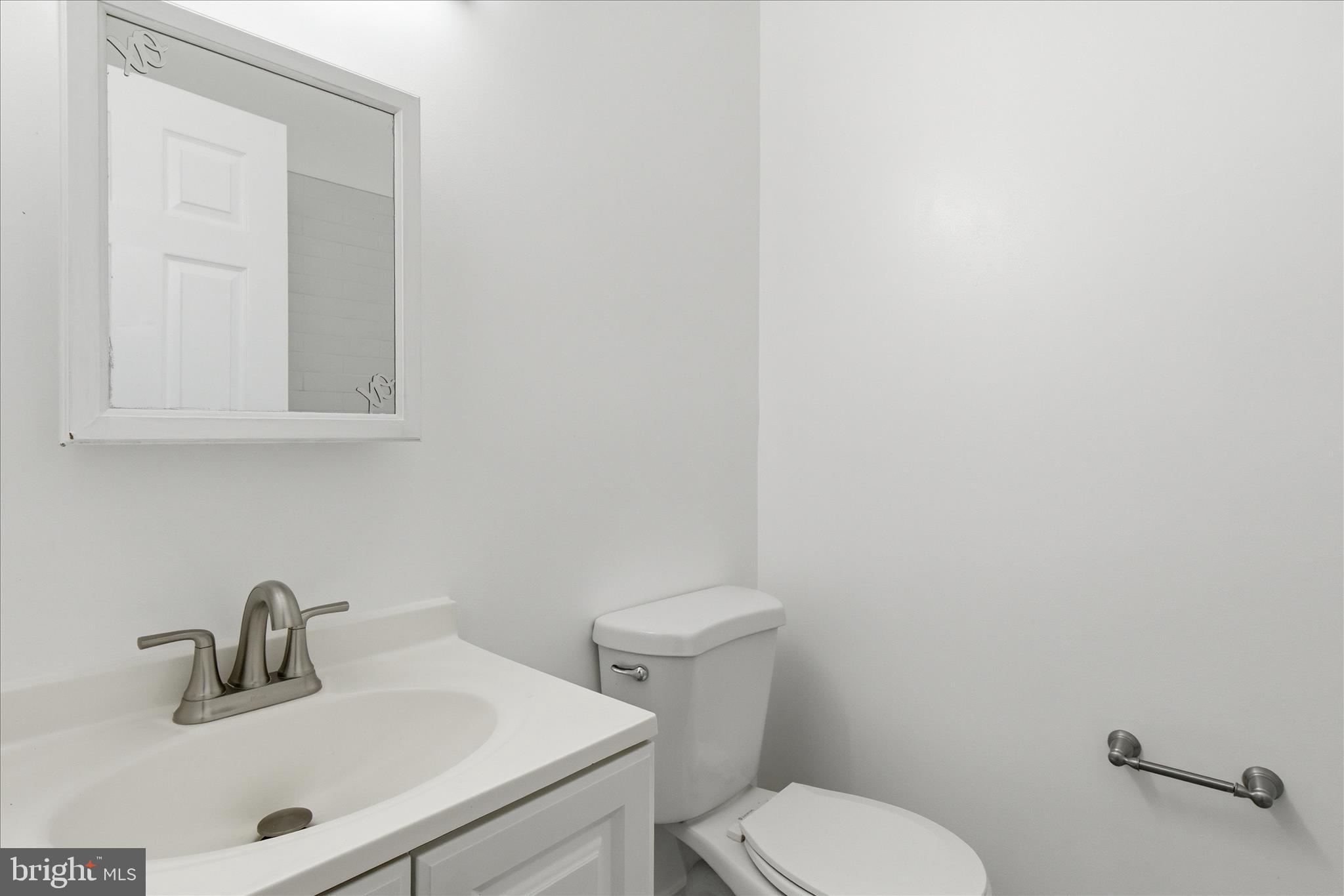 221 20th Street Northeast, Unit 3 Washington, DC 20002 - Photo 25 of 30 a bathroom with a sink and a toilet