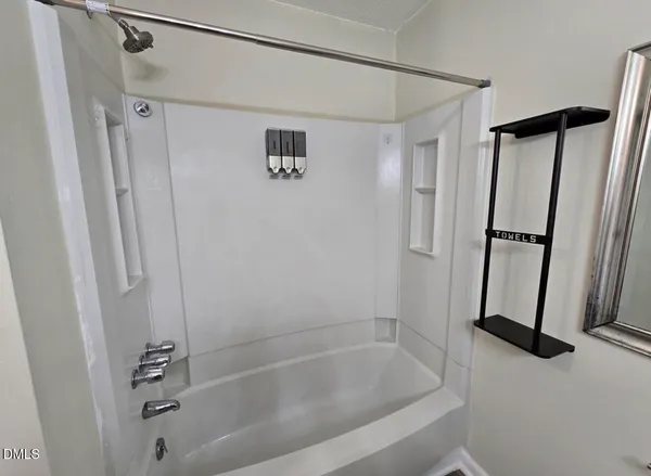 a bathroom with a bathtub