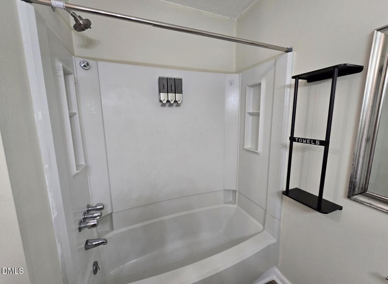 3071 Huntleigh Drive, Unit 3071 Raleigh, NC 27604 - Photo 19 of 25 a bathroom with a bathtub