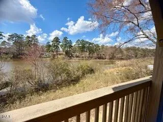 a view of a lake from a balcony